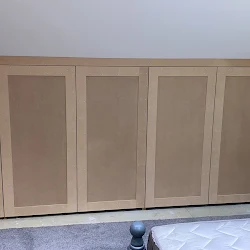 Made-to-measure fitted wardrobe with shaker-style doors